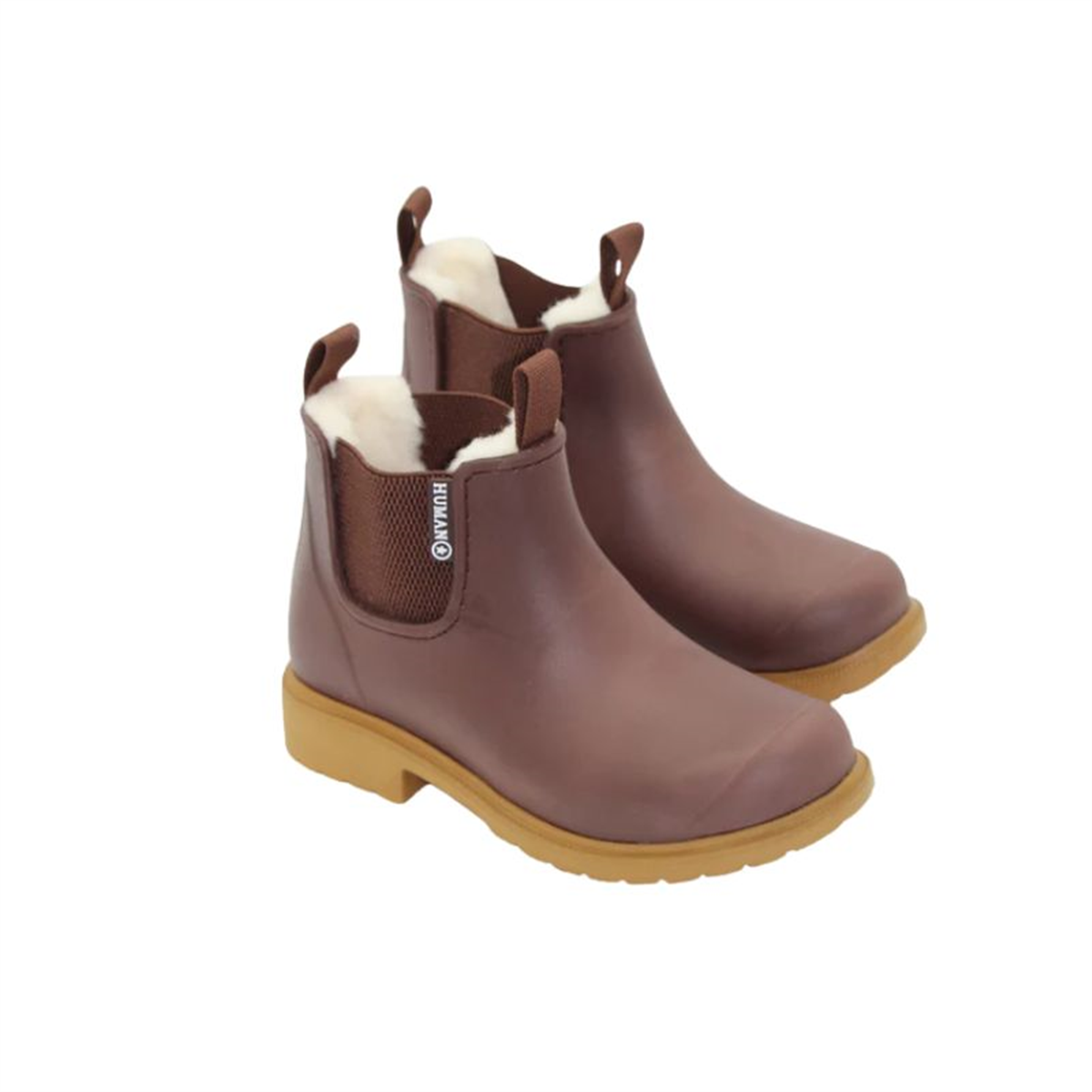 Pair of chocolate brown rubber boots with white fur lining on a white background