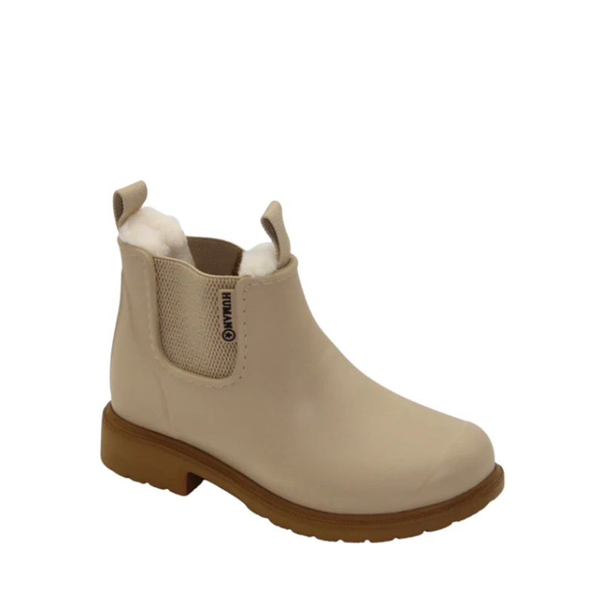 Beige Chelsea boot with brown sole on a white background