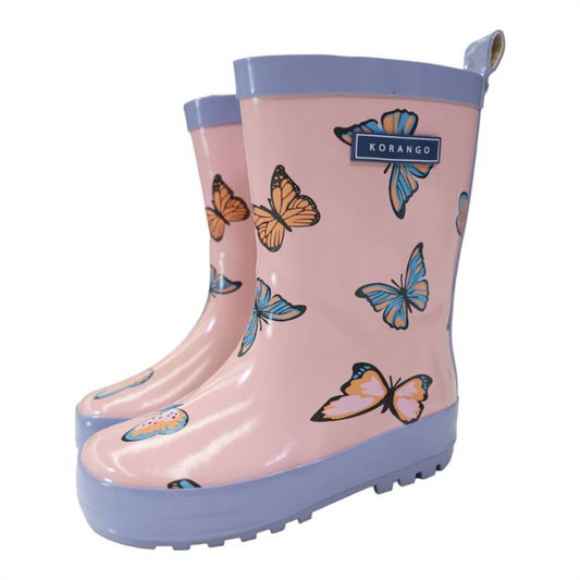 Korango children's pink rain boots featuring a colorful butterfly pattern and contrasting purple soles, shown in a front side view